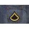 Private First Class Patch shown on jeans