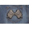 Small Beautiful Angel Wings Grey Patch | Embroidered Patches Small Beautiful Angel Wings Grey Biker Patch shown on jeans