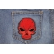 Small Cracked Skull Patch Red shown on jeans