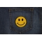 Smiley Patch 2.5 Inch Yellow shown on jeans