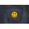 Smiley Patch 2 Inch Yellow shown on jeans