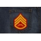Staff Sergeant Red Patch shown on jeans