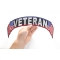 Veteran US Flag Rocker Patch | Embroidered Patches Veteran Patch, US Flag Large Rocker Patch shown on hand for size comparison