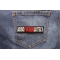 Absofuckinlutely Patch shown on jeans