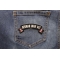 Afghan War Vet Small Ribbon Rocker shown on jeans