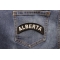 Alberta State Patch shown on jeans