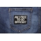 Am I Free To Go Officer Funny Biker Patch shown on jeans