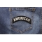 American Rocker Patriotic Iron on Patch shown on jeans