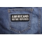 Americans Before Refugees Patriotic Iron on Patch shown on jeans