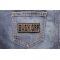 BACK OFF Patch shown on jeans
