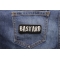 Bastard Patch shown on jeans