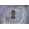 Black Support Ribbon Patch shown on jeans