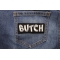 BUTCH Funny Iron on Patch shown on jeans