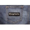 Captain Patch In Old English shown on jeans