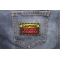 Caution Too Hot To Handle Patch | Embroidered Patches Caution Too Hot To Handle Patch shown on jeans
