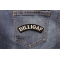 Dilligaf Patch shown on jeans