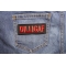 Dilligaf Patch In Red | Embroidered Patches Dilligaf Patch shown on jeans