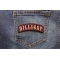 Dilligaf Patch shown on jeans