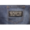 Don't Mess With Bikers They Don't Just Look Crazy Patch shown on jeans