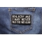 Enjoy Me I May Never Pass This Way Again Naughty Iron on Patch shown on jeans