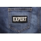 Expert Patch shown on jeans