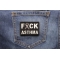 FCK Asthma Gray Ribbon Patch shown on jeans