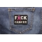 FCK Cancer Pink Ribbon Patch shown on jeans