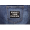 Fight The Power Iron on Morale Patch shown on jeans