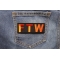 FTW Orange Patch FTW Patch shown on jeans