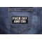 Fuck Off and Die Patch shown on jeans