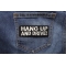 Hang Up and Drive Patch shown on jeans