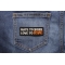 Hate To Work Love To Ride Patch shown on jeans
