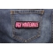 High Maintenance Patch shown on jeans