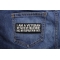 I Am A Veteran My Oath Of Enlistment Has No Expiration Date Patch shown on jeans