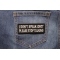 I Don't Speak Idiot Please Stop Talking Funny Iron on Patch shown on jeans