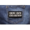 I Know I Know License and Registration Patch shown on jeans