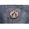 I'm Your Huckleberry Pistols Iron on Novelty Patch shown on jeans