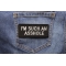 I'm Such An Asshole Funny Iron on Patch shown on jeans