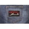 Infidel Patch shown on jeans