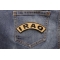 Iraq Small Arm Rocker Patch Iraq Small Arm Rocker Patch shown on jeans