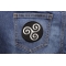 Karma Symbol Patch Karma Symbol Iron on Novelty Patch shown on jeans