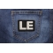 LE Law Enforcement Patch shown on jeans