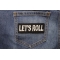 Let's Roll Iron on Fun Patch shown on jeans