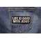 Life Is Good With Jesus Patch shown on jeans