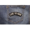 Live To Ride Patch shown on jeans