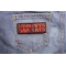 Loud Pipes Save Lives Red Patch Loud Pipes Save Lives Patch shown on jeans