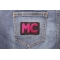 Pink MC Patch shown on jeans