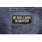 My Give A Damn Is Busted Funny Iron on Patch shown on jeans