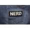 Nerd Patch Nerd Funny Iron on Patch shown on jeans