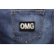 Omg Patch shown on jeans